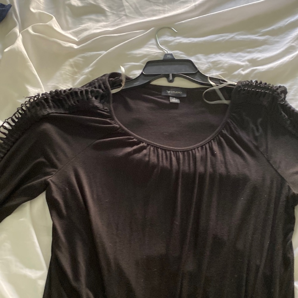 Cutout long sleeve top.  Can be dressed up or down for any night out